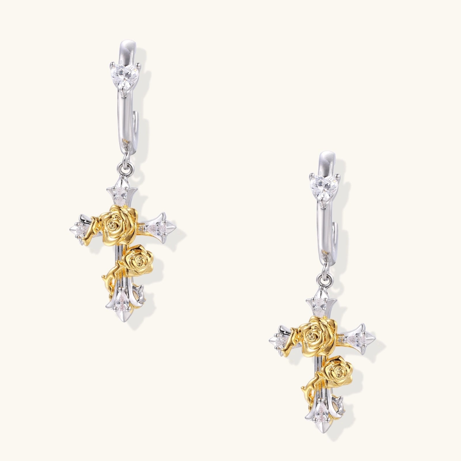 Dainty hoop earrings with crystal studs and dangling cross pendants featuring gold rose details and zirconia accents