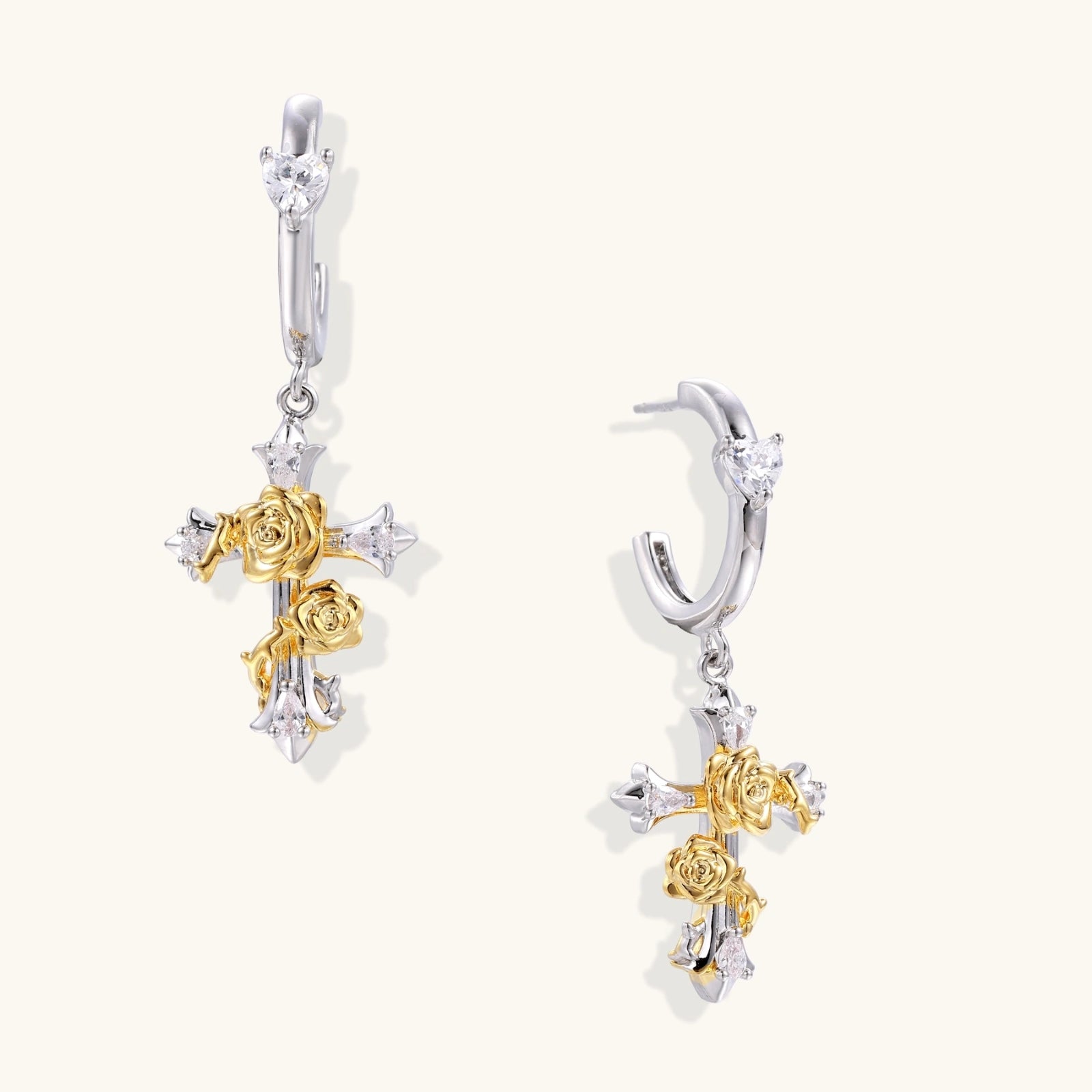 Dainty hoop earrings with crystal studs and dangling cross pendants featuring gold rose details and zirconia accents
