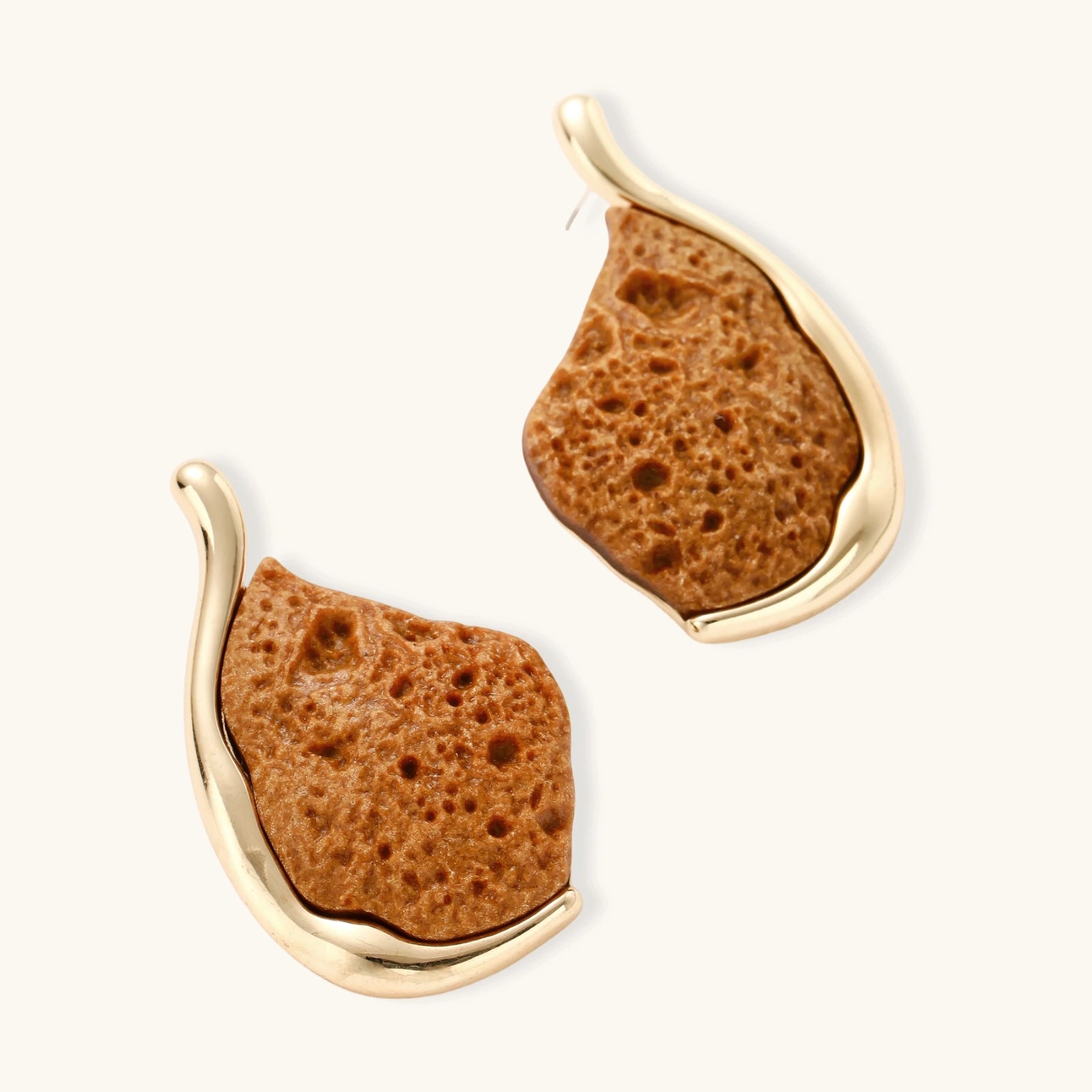Textured brown resin drop earrings with gold-toned zinc alloy frames and sterling silver posts on white background.